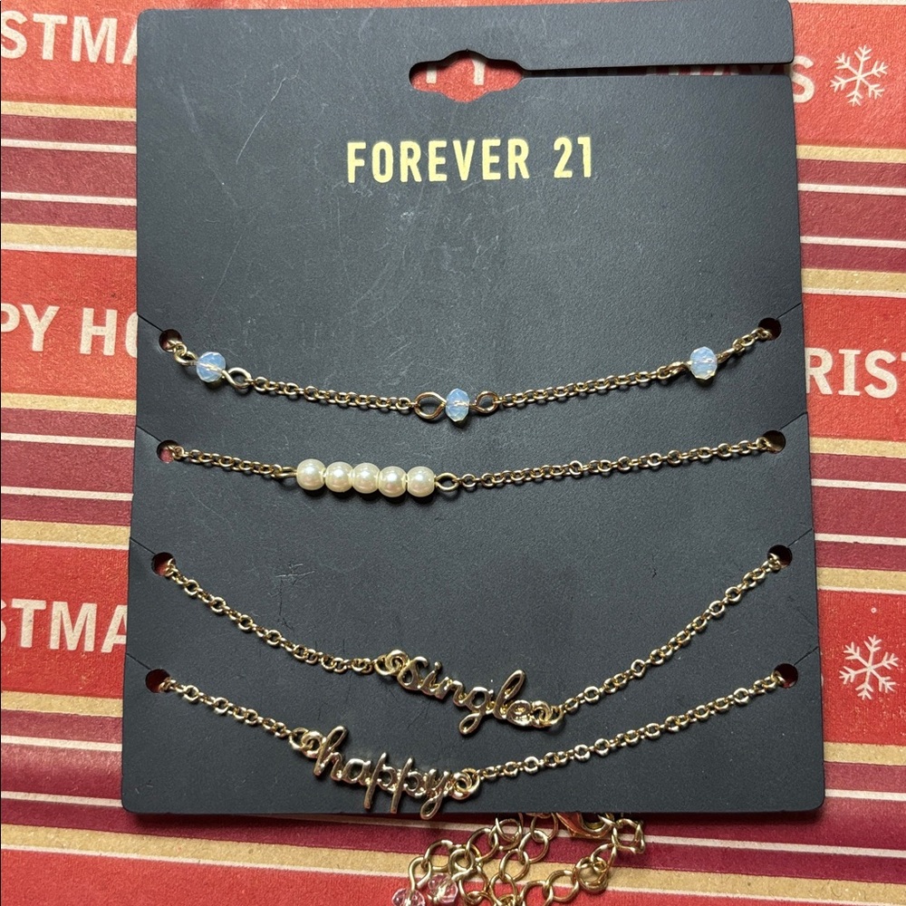 NWT Set of 4 bracelets (Can possibly be anklets too) Say SINGLE HAPPY Faux Pearl